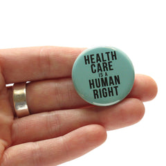 Word For Word Factory - HEALTHCARE IS A HUMAN RIGHT pinback button badge